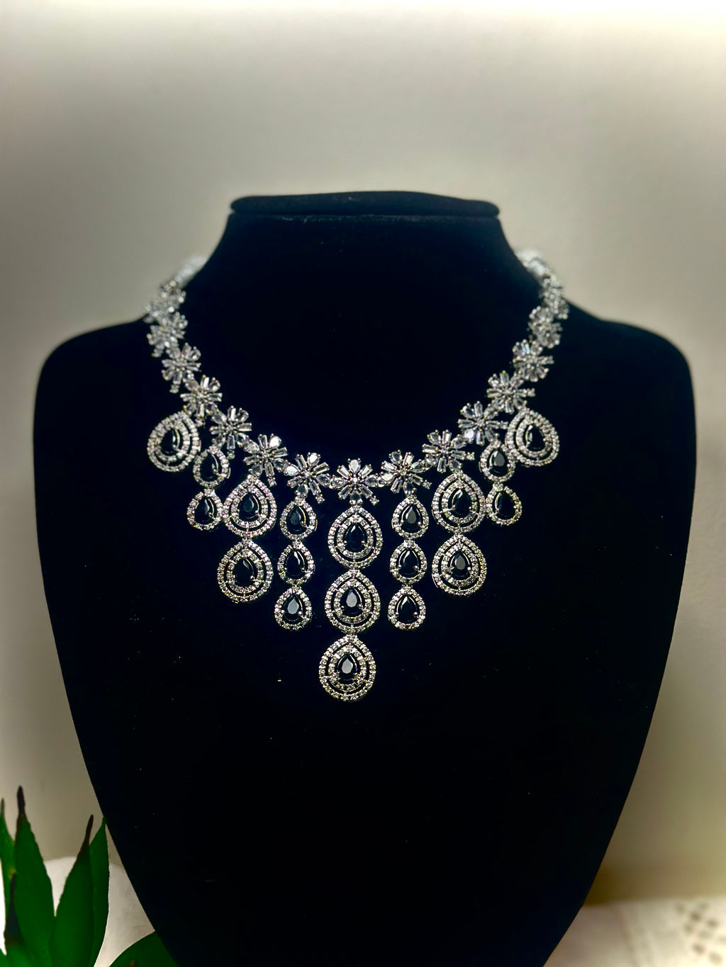 Kavita Pearl and Emerald Kundan Necklace Set