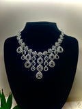 Kavita Pearl and Emerald Kundan Necklace Set