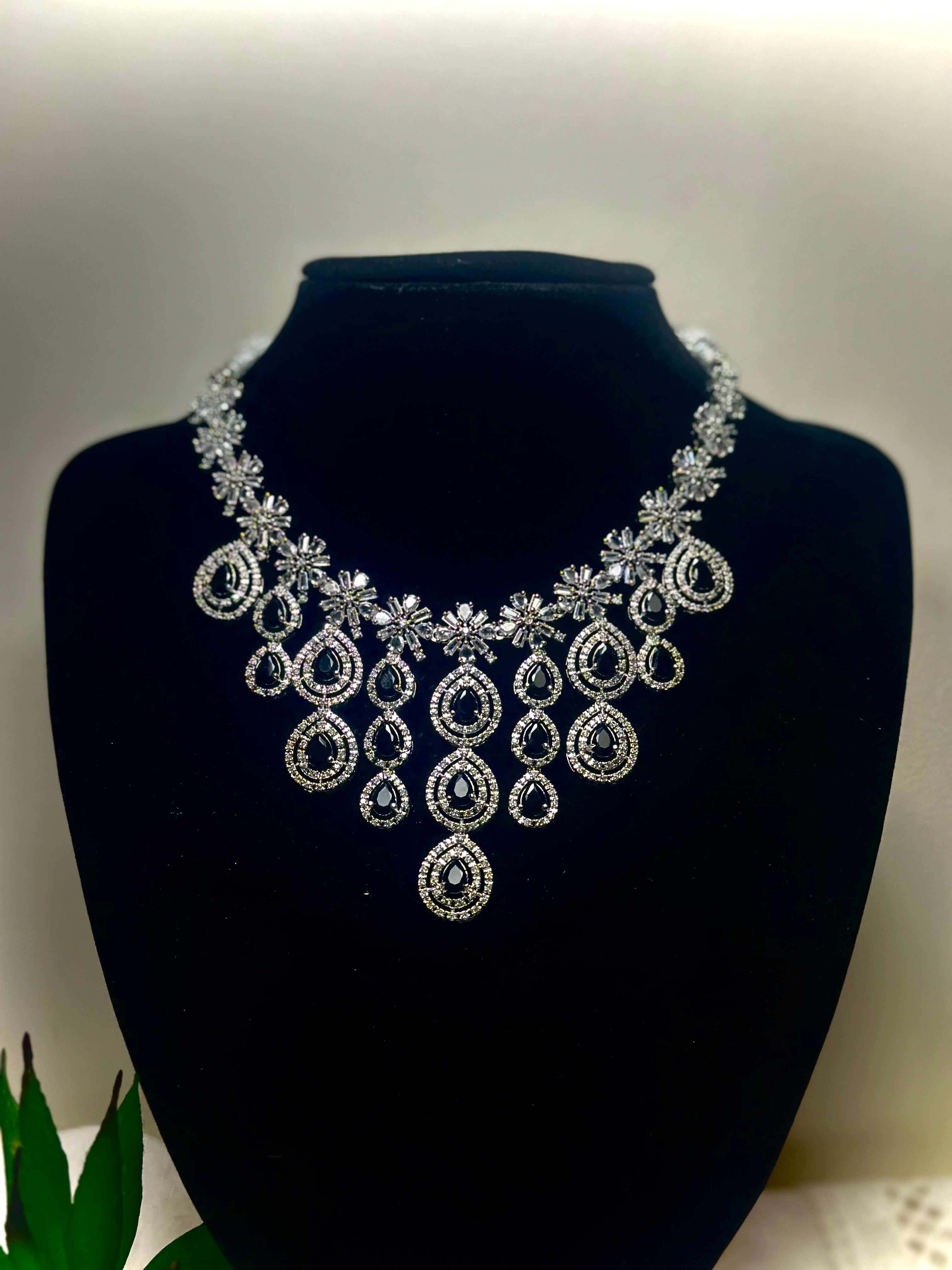 Kavita Pearl and Emerald Kundan Necklace Set